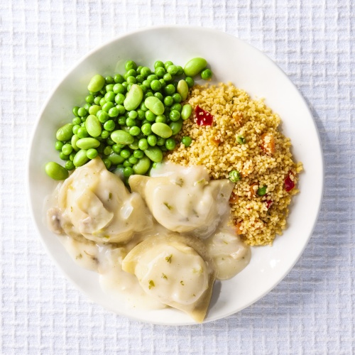 Image of Perogies with Mushroom Cheese Sauce